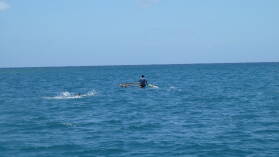 Fischer in Port Resolution, Tanna.